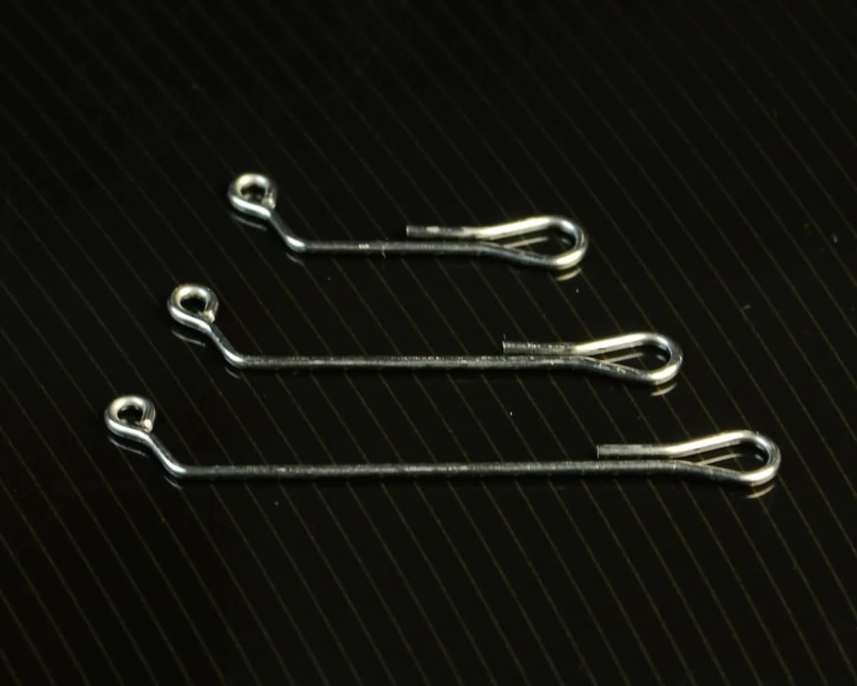 Spawn Fly Fish 60-degree jig shank with black nickel finish boosts durability.