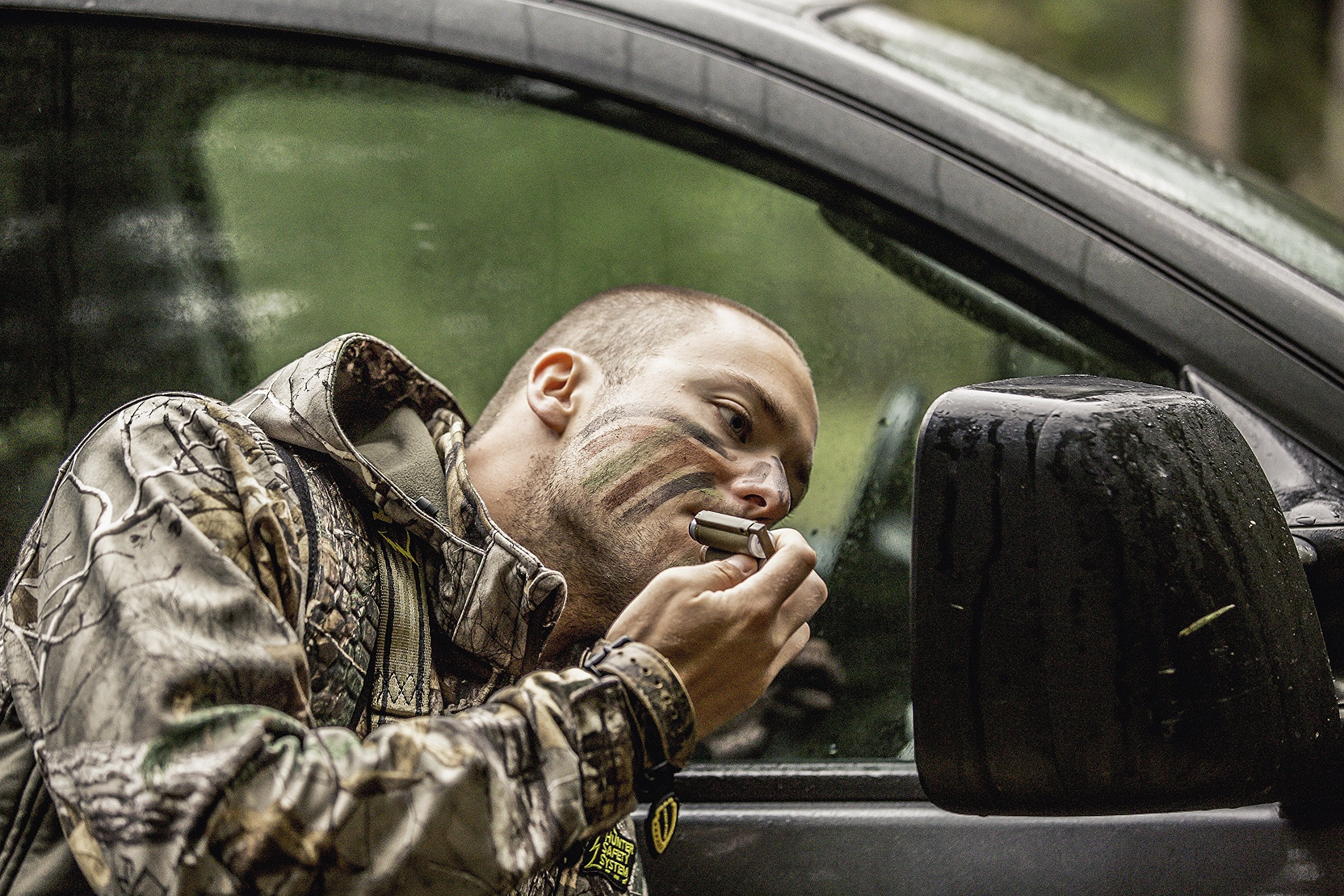 Three camo color sticks: forest green, mud brown, and flat black for custom patterns