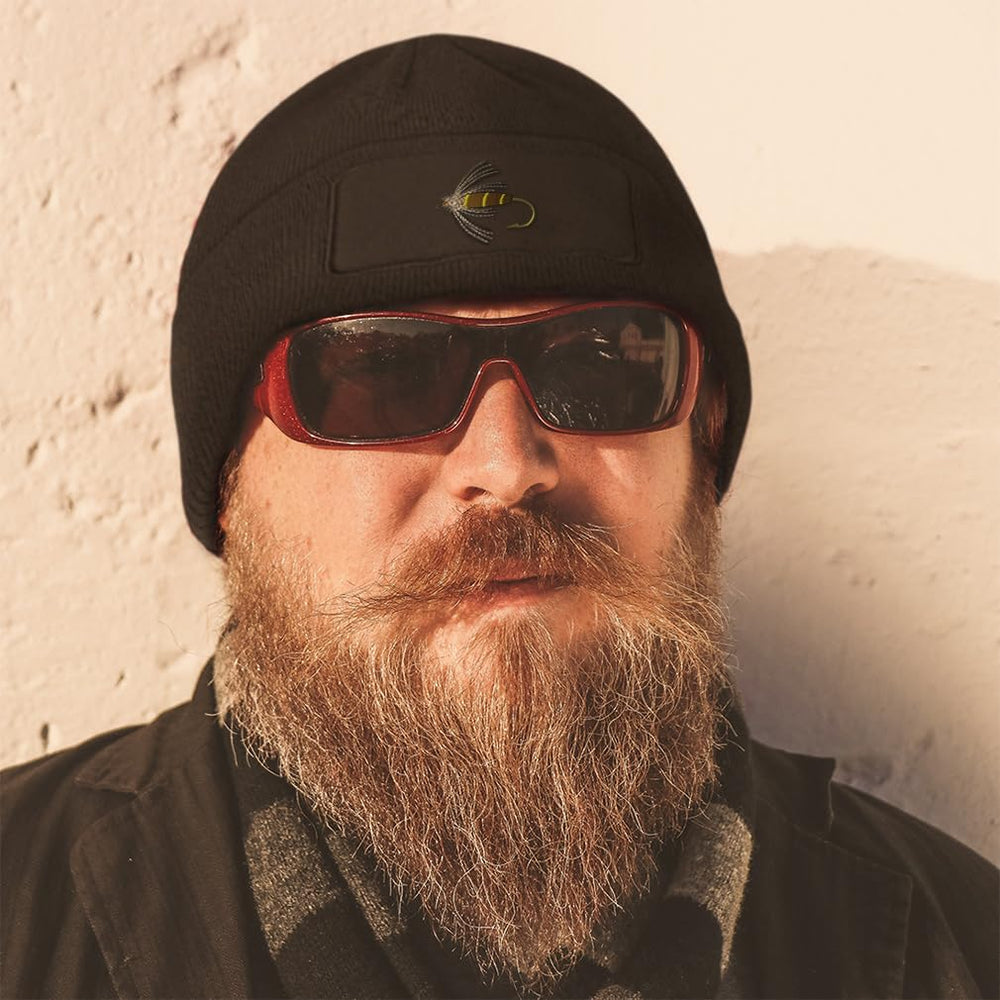 Speedy Pros dark grey patch beanie with warm knit for all-day wear.