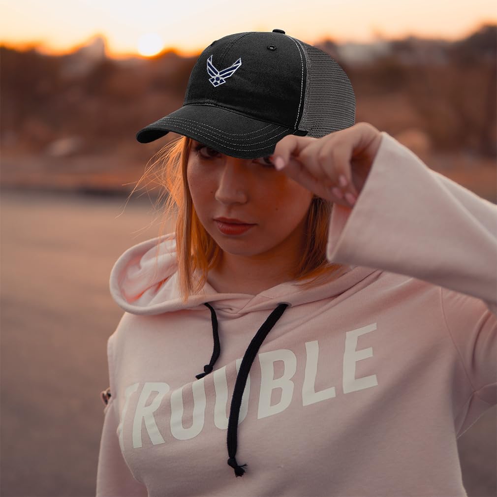 Black cotton texture and soft mesh panels of the cap.