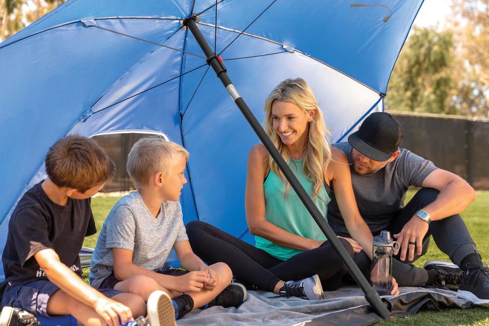 Sport-Brella Ultra blue canopy promoting clear sight lines for spectators