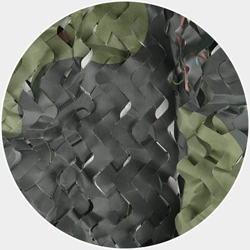 Sposuit ghillie-netting setup creates natural concealment for outdoor photography.