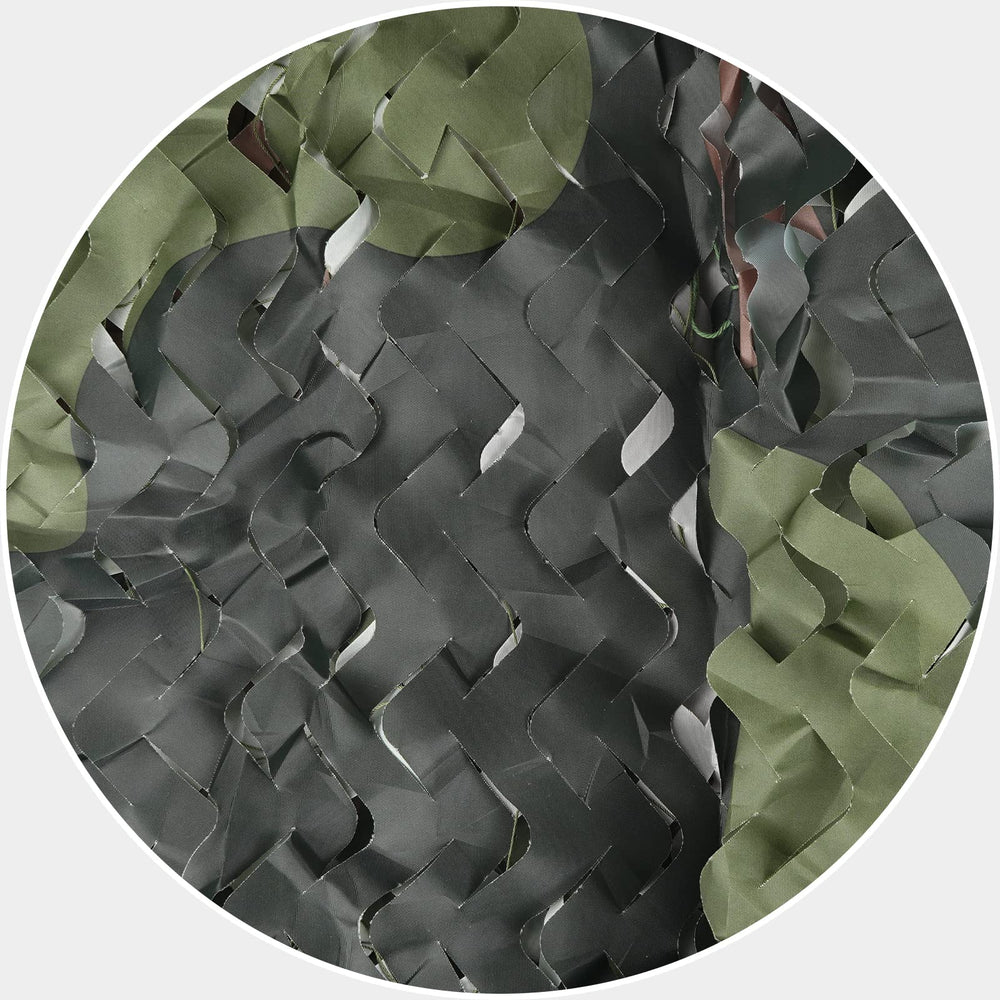 Sposuit ghillie-netting setup creates natural concealment for outdoor photography.