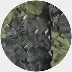 Sposuit ghillie-netting setup creates natural concealment for outdoor photography.