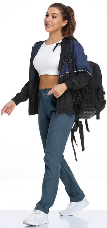 SPOSULEI womens golf travel pants in action on outdoor adventure