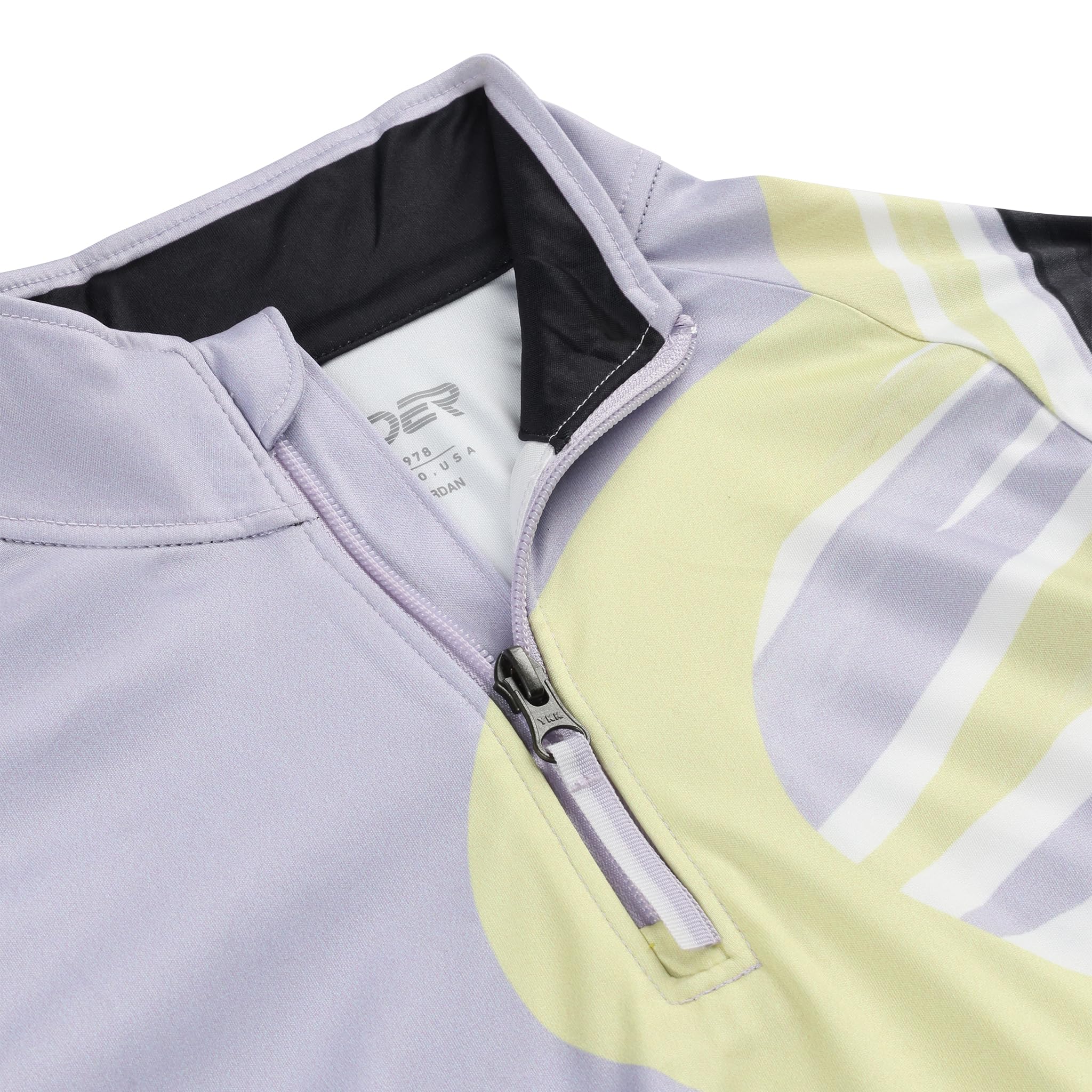 Spyder Surface half zip T-Neck jacket worn on the slope, suitable for cold-weather layering.