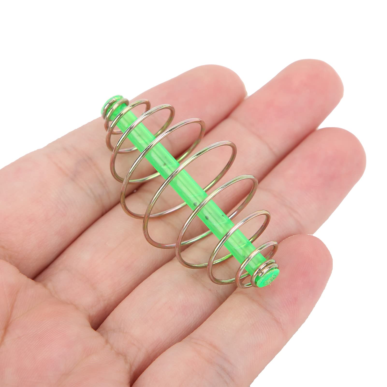 Barrel-shaped bait retention design of feeder
