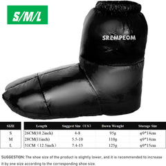Srempeom down booties on foot deliver warm campsite comfort.