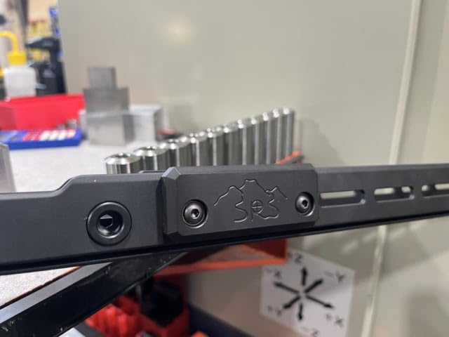 Salmon River Solutions SRS M LOK fore end weights, side view, compatible with ARCA rails.