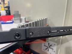 Salmon River Solutions SRS M LOK fore end weights, side view, compatible with ARCA rails.