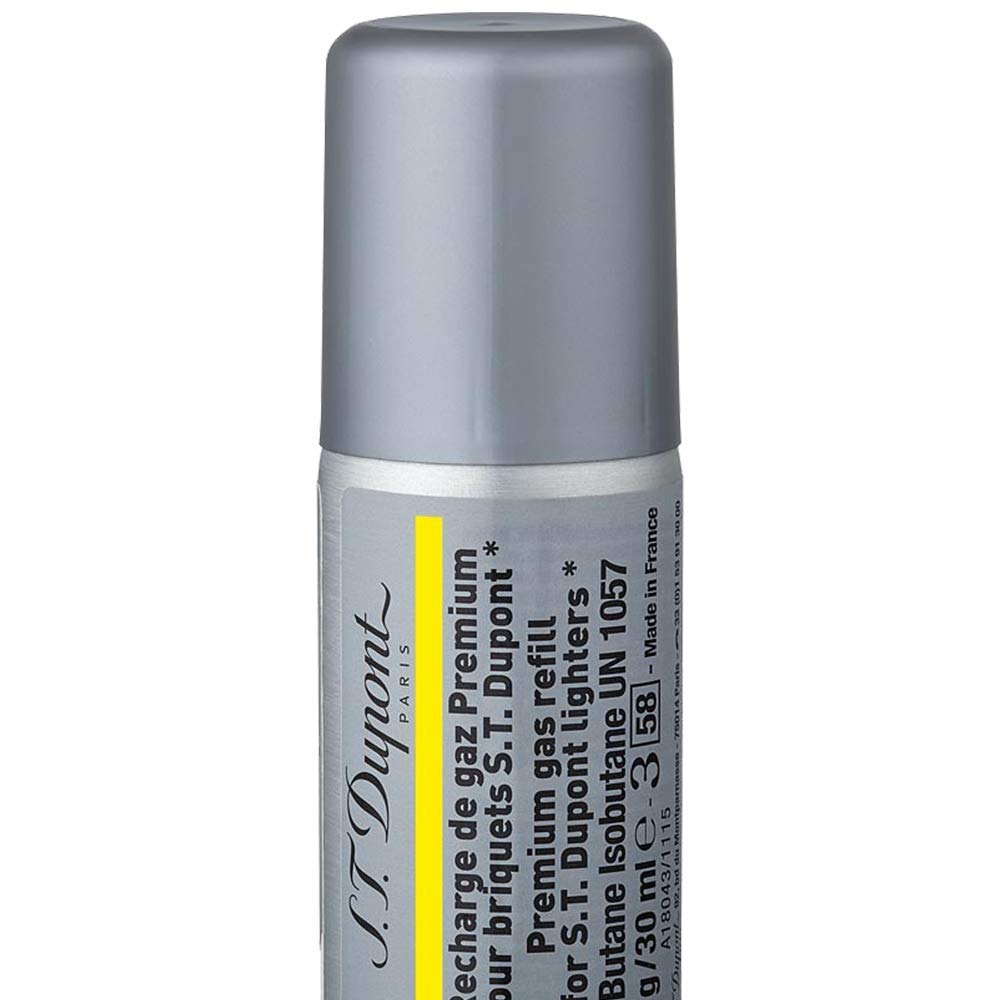 ST Dupont Yellow Gold butane refill cap close-up shows safe, controlled topping.
