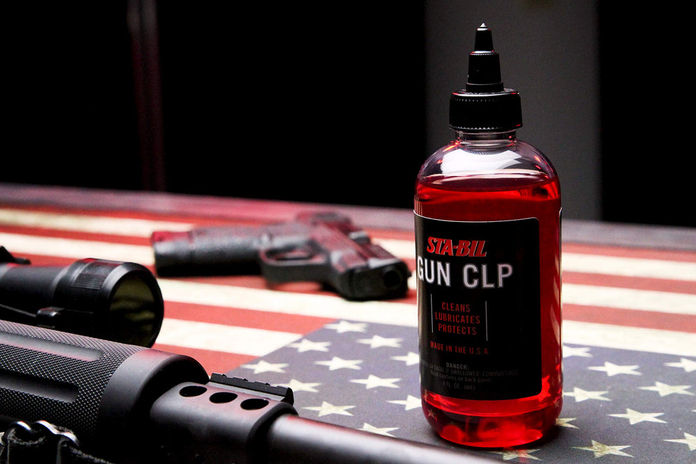 Gun CLP displacing water and lubricating firearm