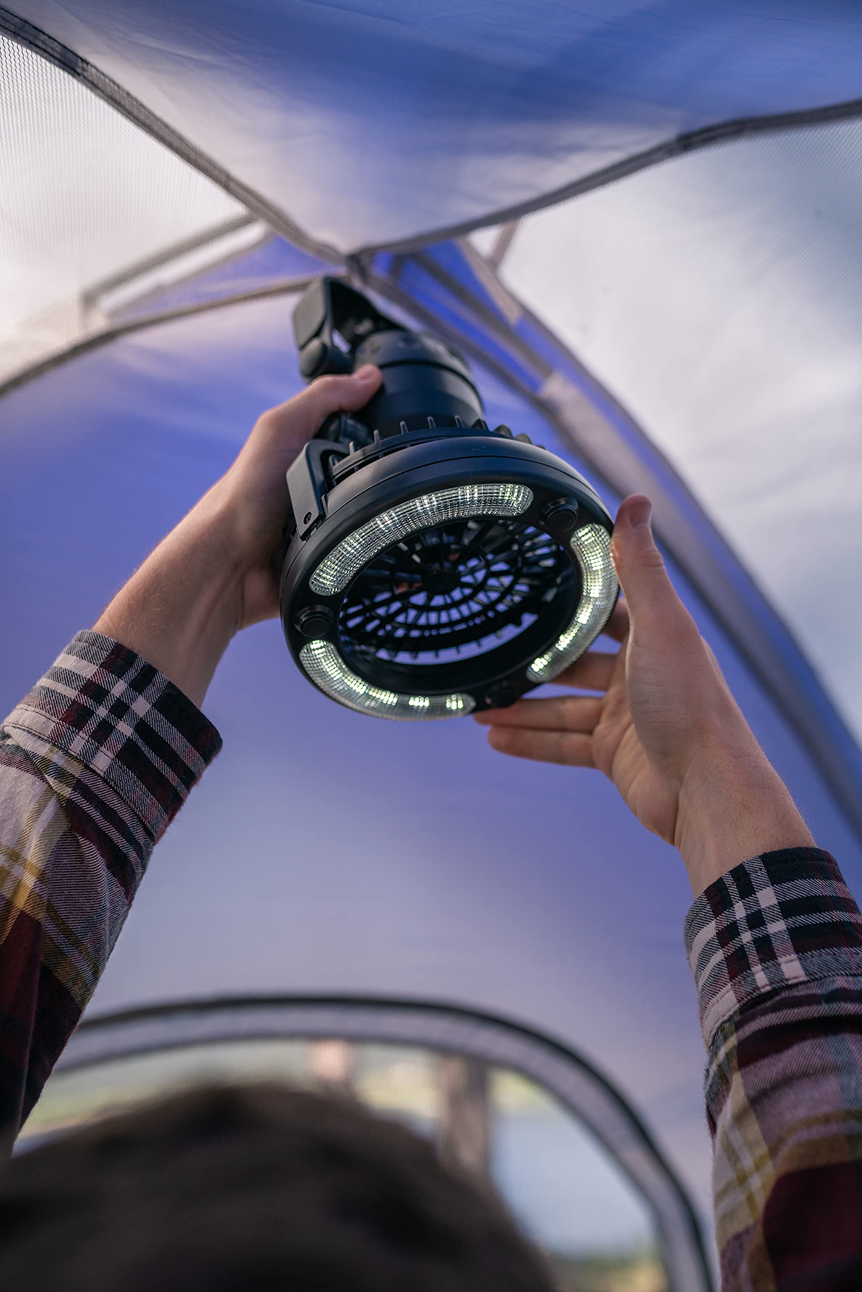 Stansport 450 lantern with fan in tent setup with glow
