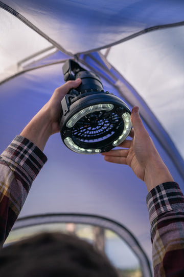 Stansport 450 lantern with fan in tent setup with glow