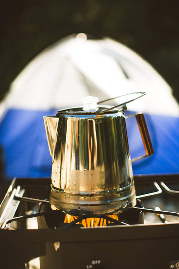 Stansport coffee pouring action during outdoor gatherings.