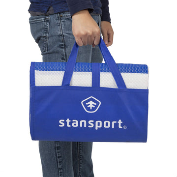 Stansport blue outdoor mat ready for camping trips and beach days.