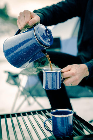 Stansport mug with stainless steel rim detail adds durability and style.