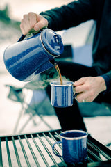 Stansport mug with stainless steel rim detail adds durability and style.