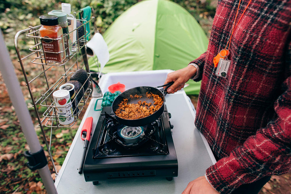 Stansport stove in outdoor catering setup for events.