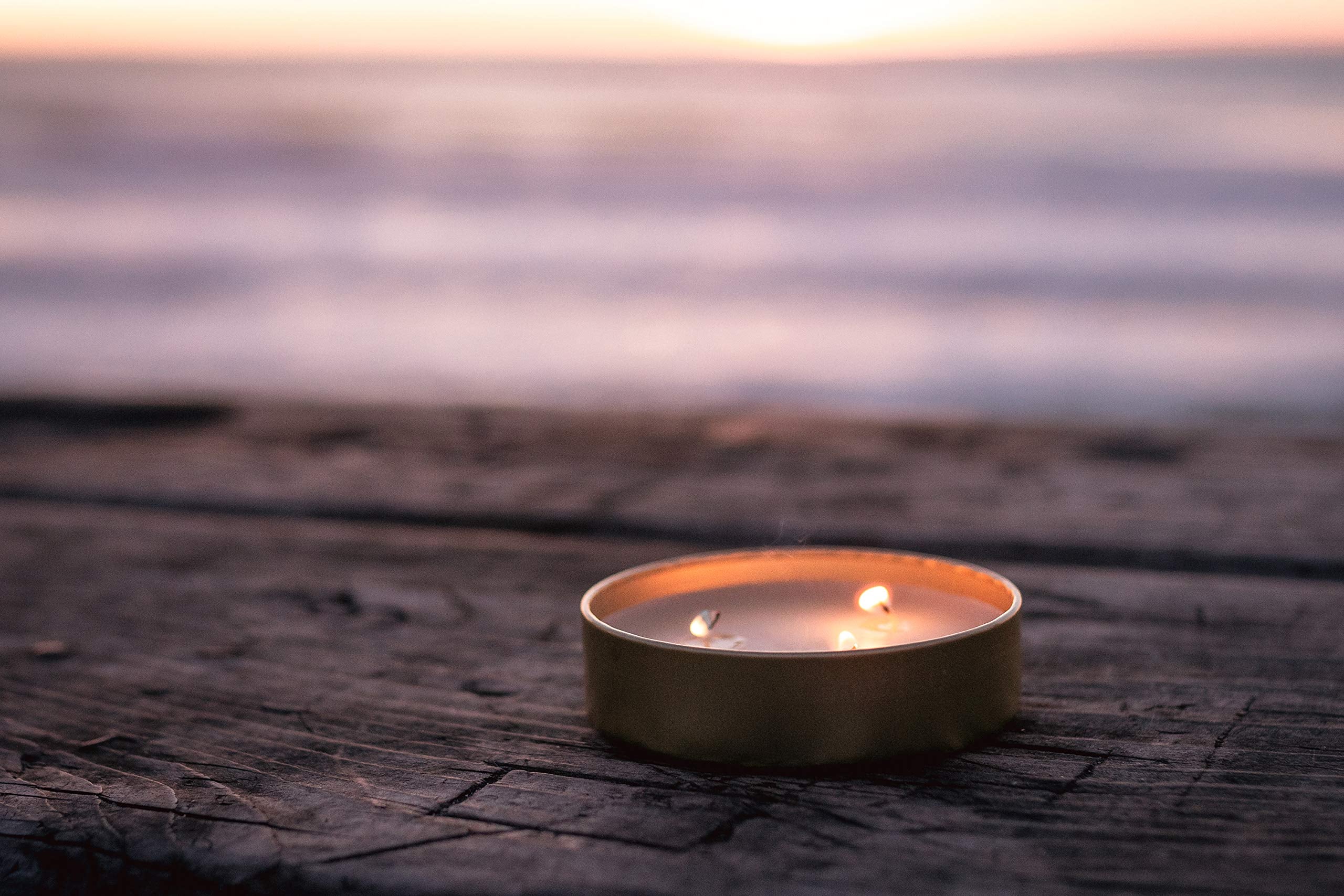 Stansport Survival Candle with two wicks delivers brighter light for outdoor evenings.