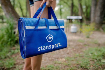 Stansport tatami mat with mildew-resistant material for outdoor durability.