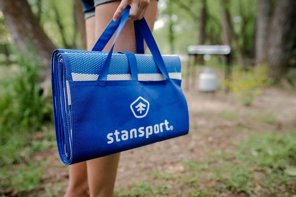 Stansport tatami mat with mildew-resistant material for outdoor durability.