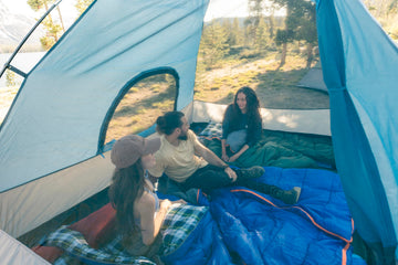 Stansport Trinity River Dome Tent D-style door with mesh window for easy access.