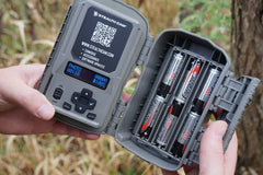 Stealth Cam DS4K Ultimate back view highlighting secure latch and ports