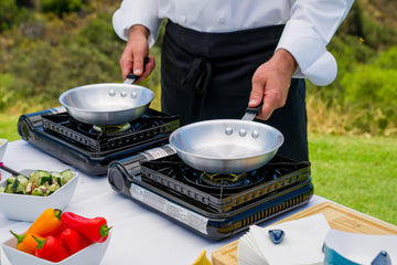 Sterno portable stove with carrying case facilitates easy transport for picnics and catering.