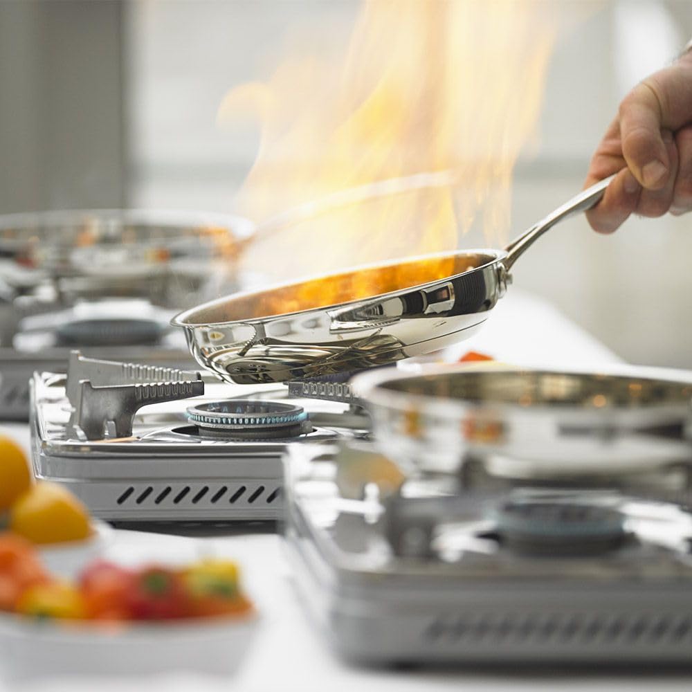 Sterno portable stove showcasing safety features like ignition lock and vents.