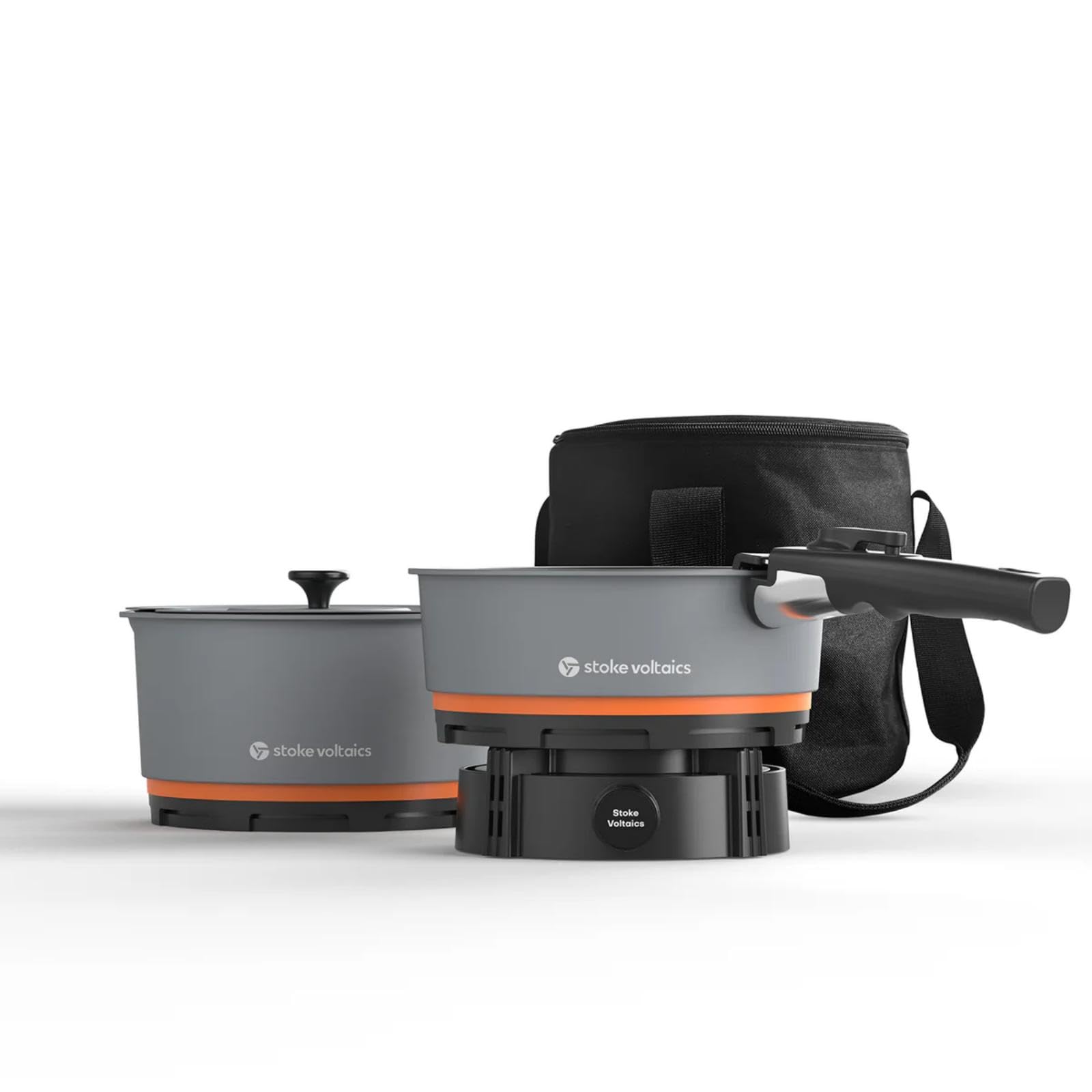 Stoke Voltaics Nomad pan sizzling on windy campsite for flavorful outdoor meals.