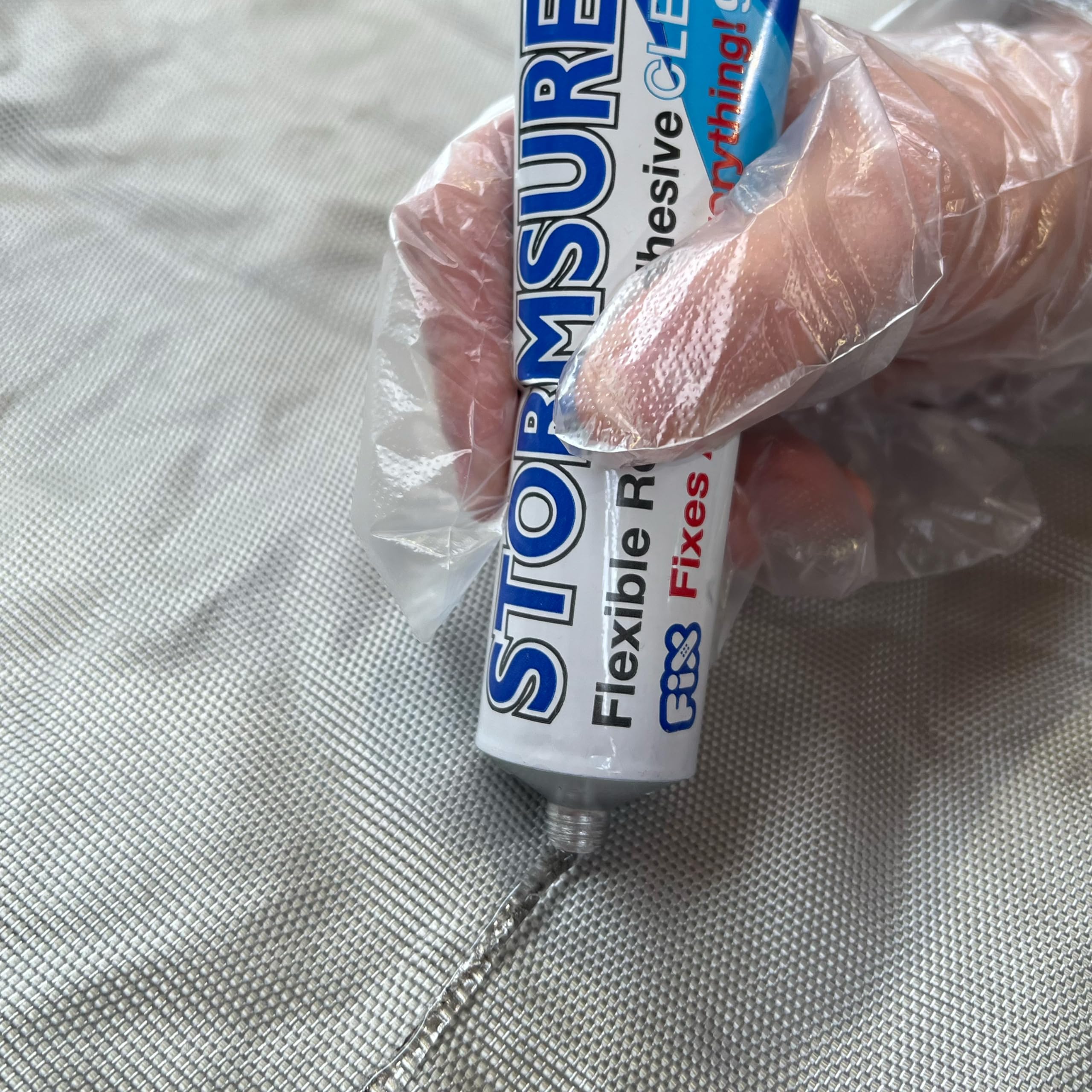 Stormsure rubber repair adhesive application seals seams effectively