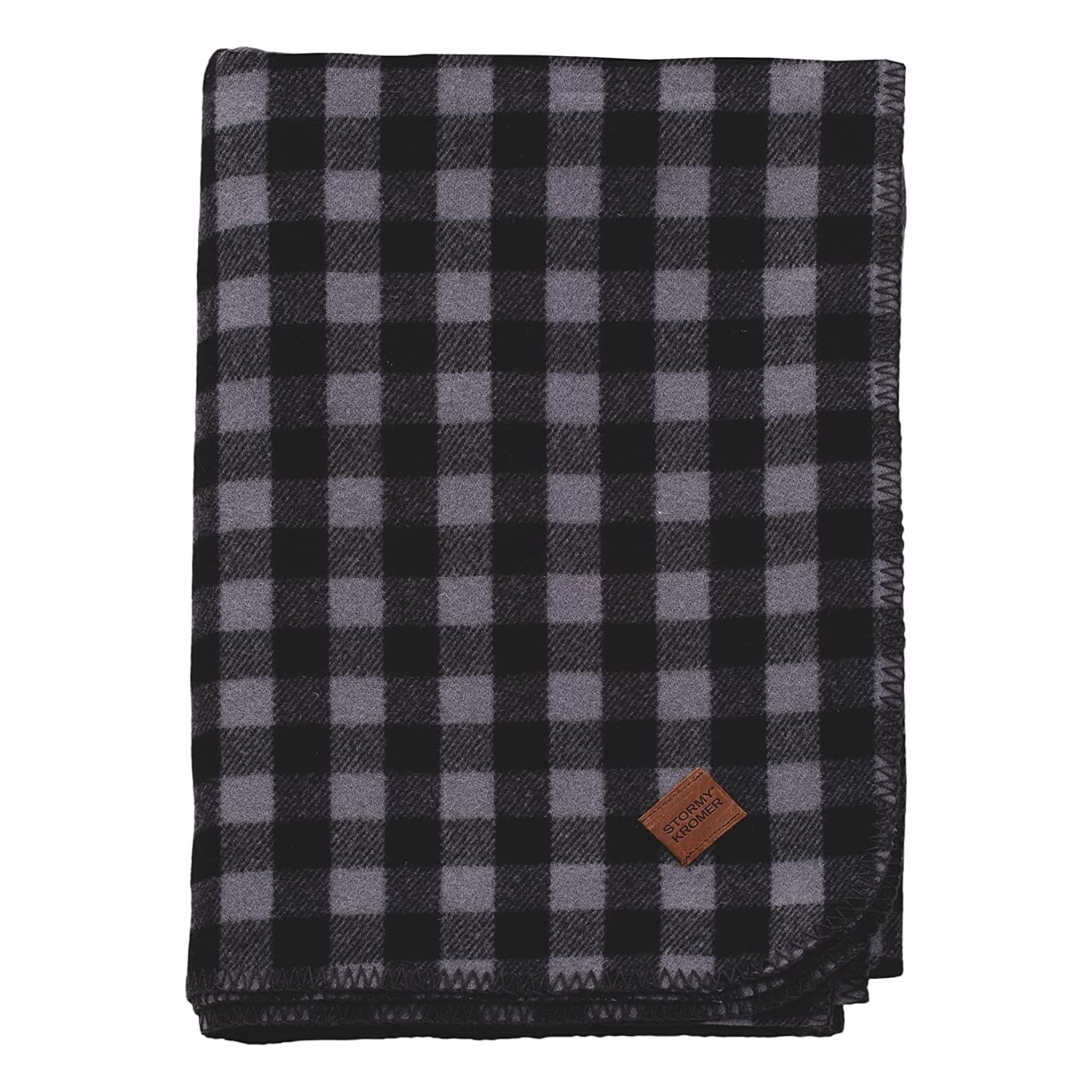 Stormy Kromer plaid wool blanket in black and gray, cozy warmth.