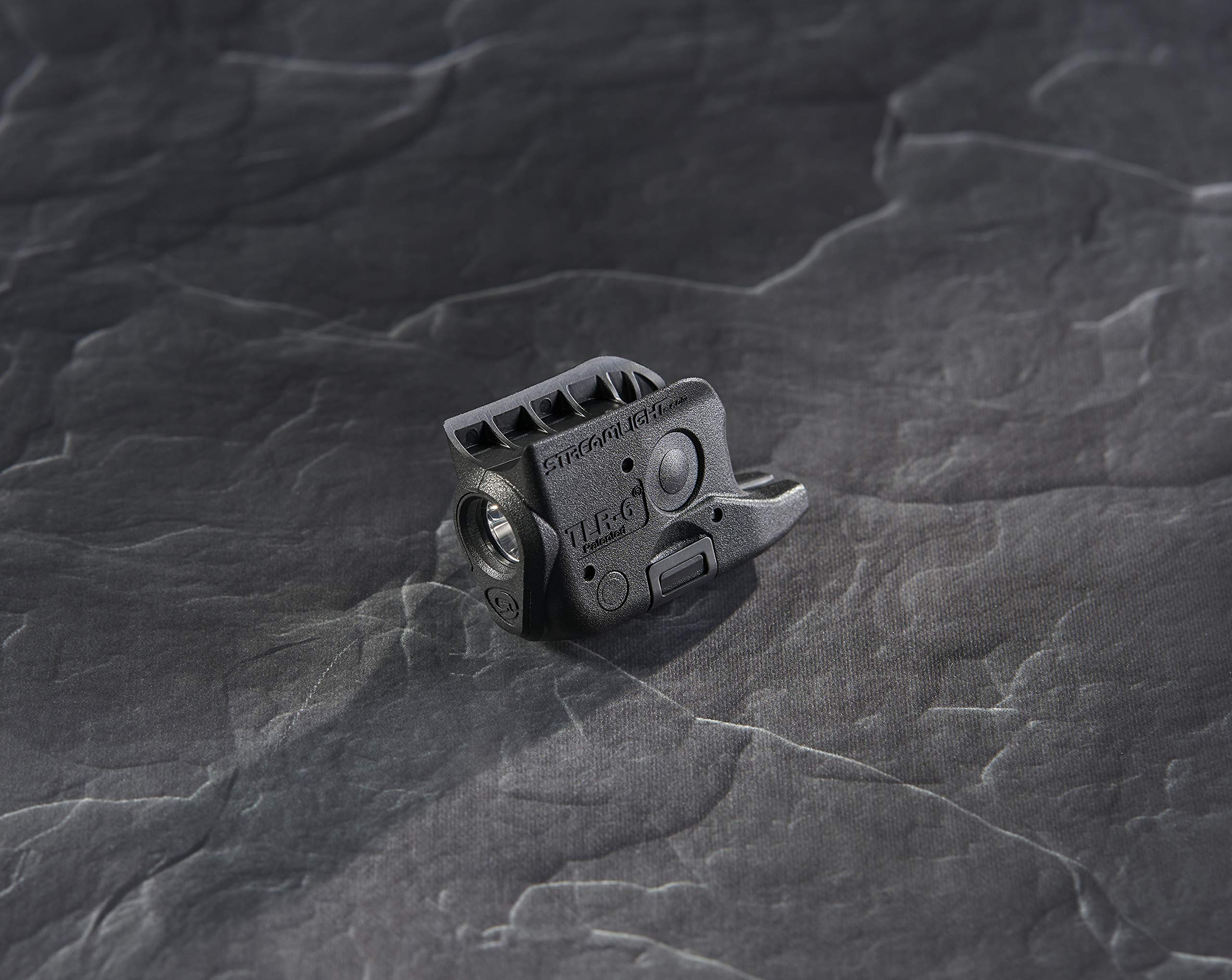 Close-up of TLR-6 on Glock trigger guard — side view