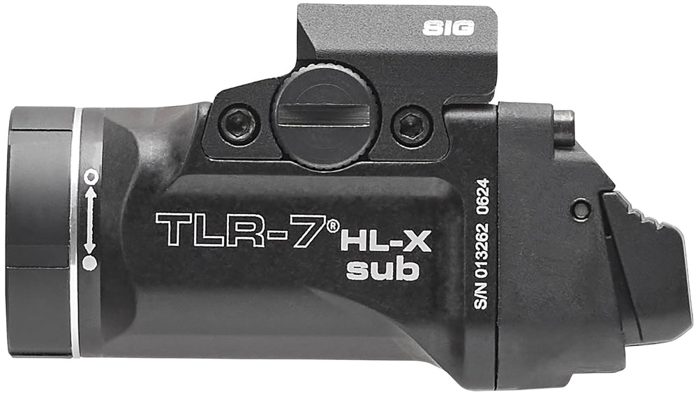 Rail-grip clamp securing the light to the handgun