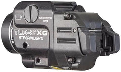 Green aiming laser integrated with pistol light on rail