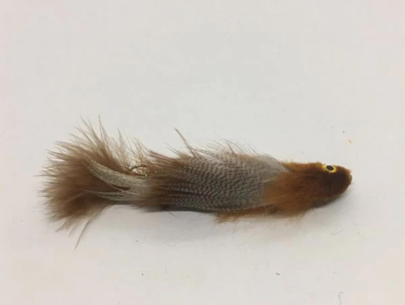 Strike Fly Boogie Man Brown articulated streamer size 6, showcases lifelike motion in water.