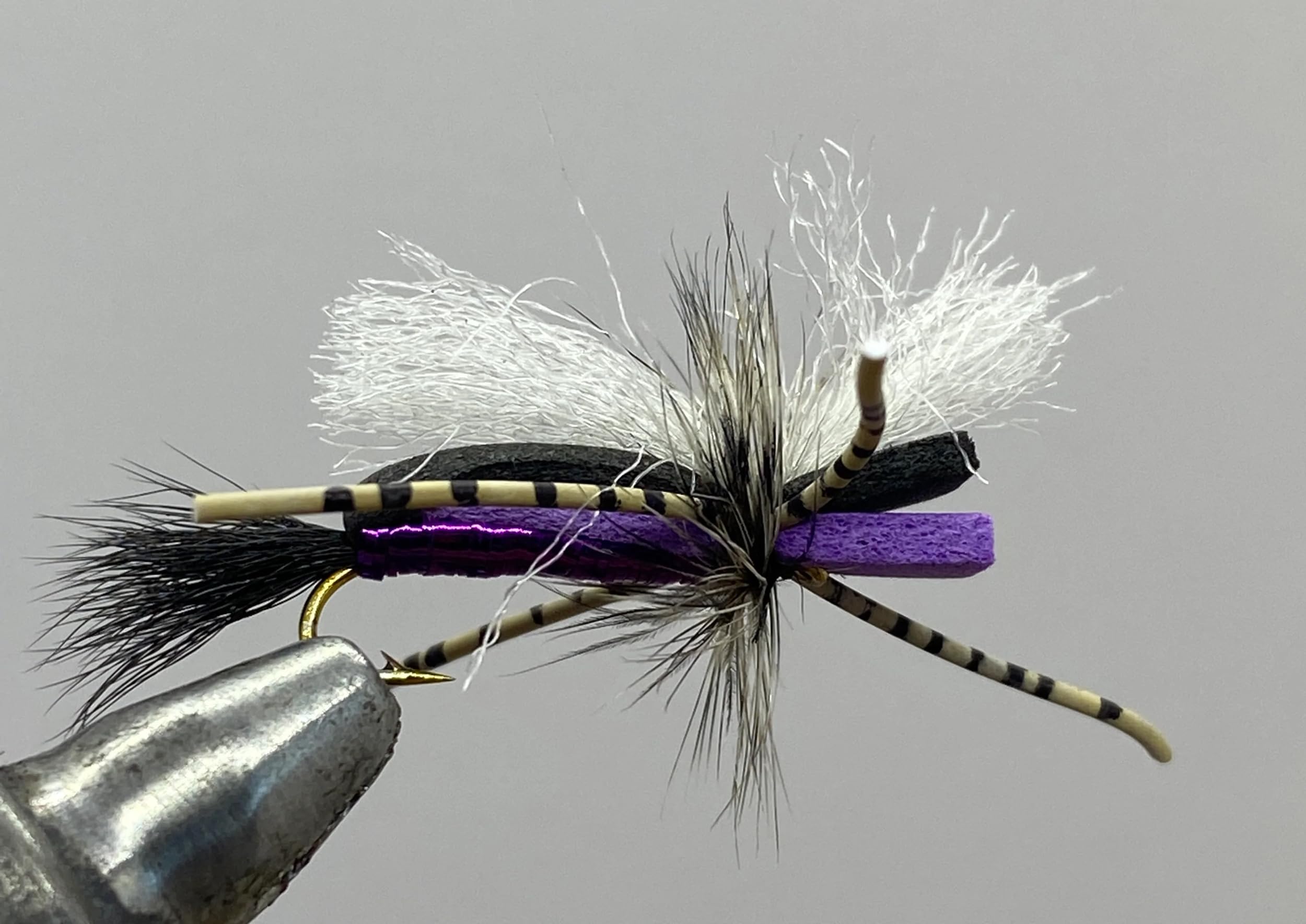 Strike Fly Hippie Stomper Purple Dry Fly shown in action catching trout