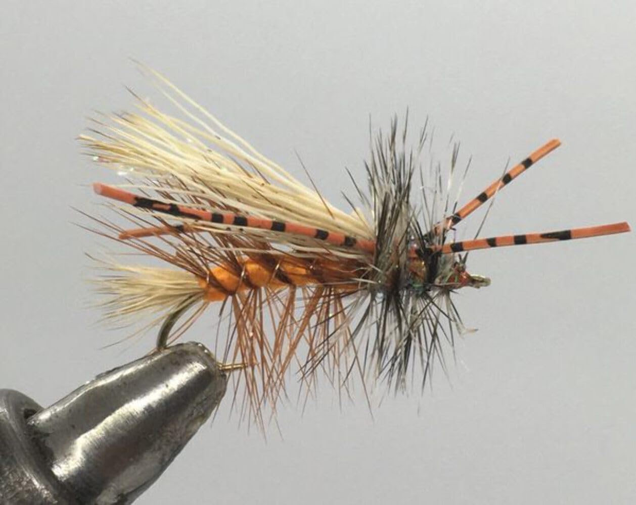 Strike Fly One Dozen orange rubber-legged crystal stimulator dry fly for confident trout angling