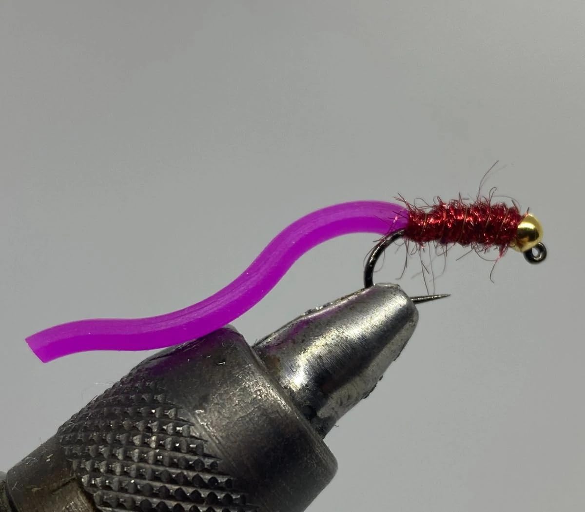 Strike Fly Tungsten Jig Squirmy Worm Purple Size 10 for trout fishing; quick sink and enticing movement.