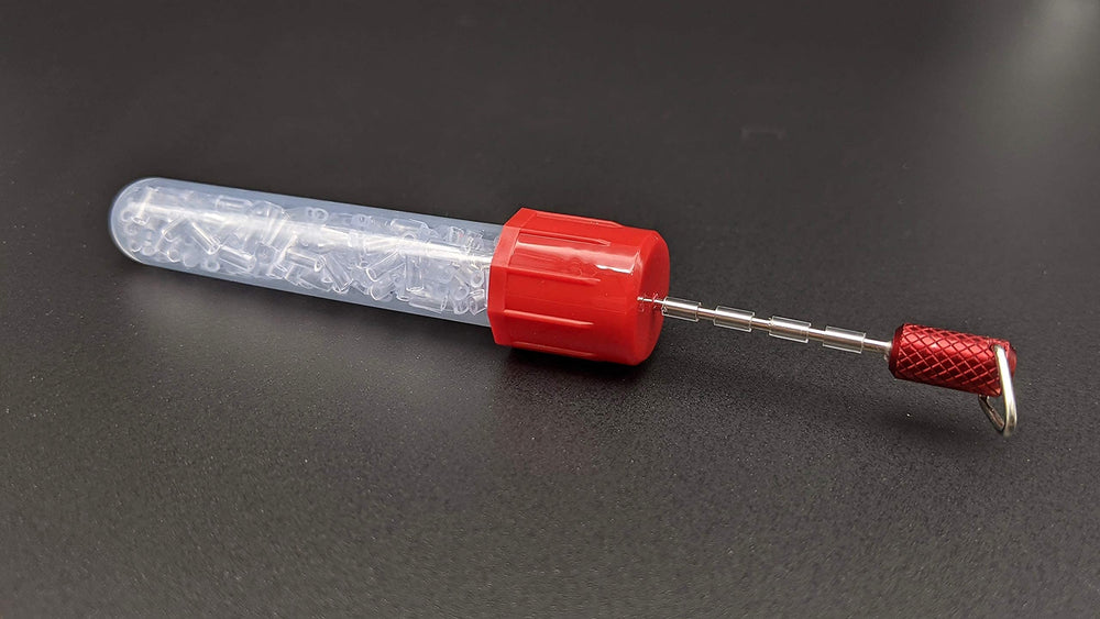 Red-handle indicator tool loaded with sleeves