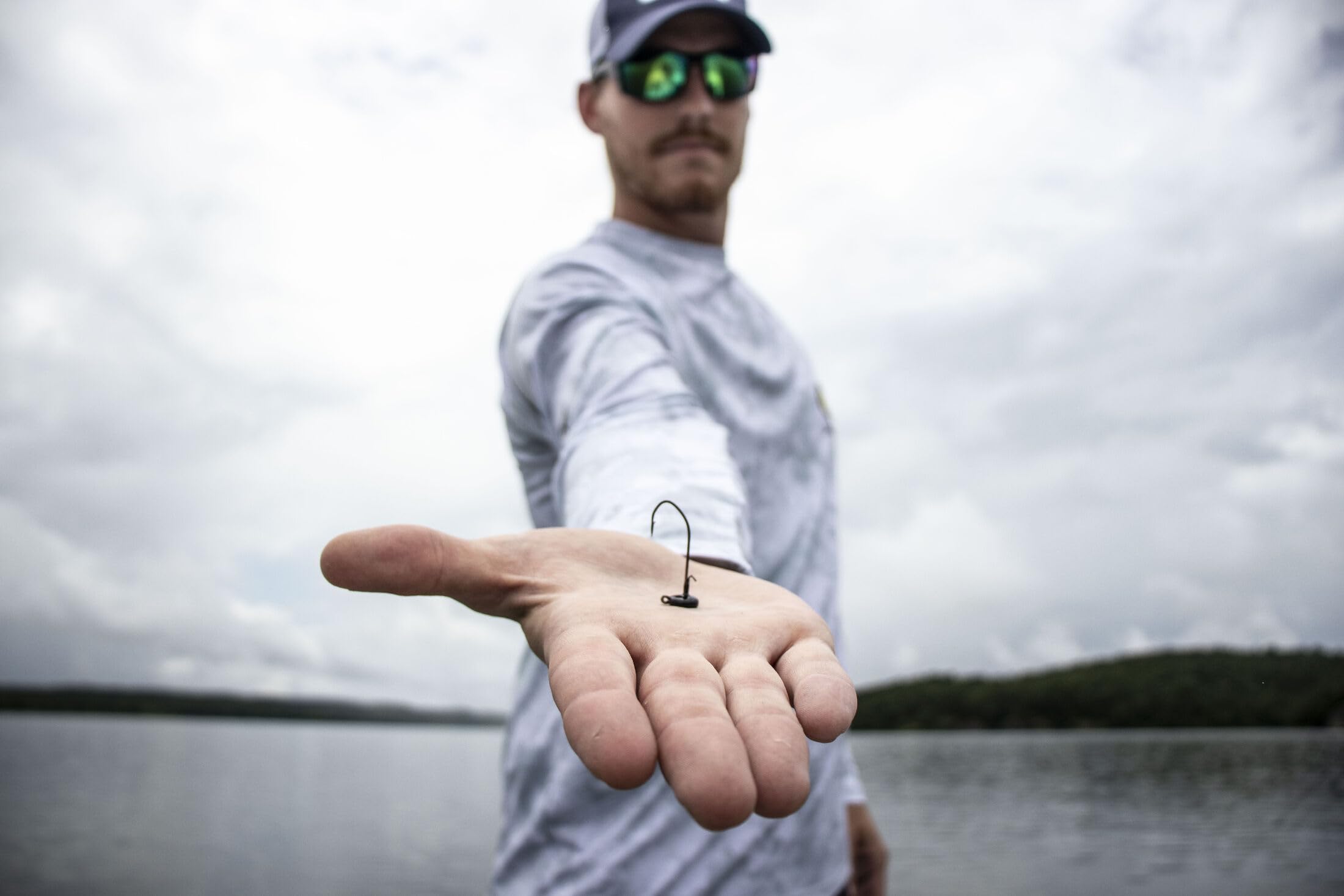 Strike King Ned Rig Head features a sickle-style hook and wire keeper for secure hookups.