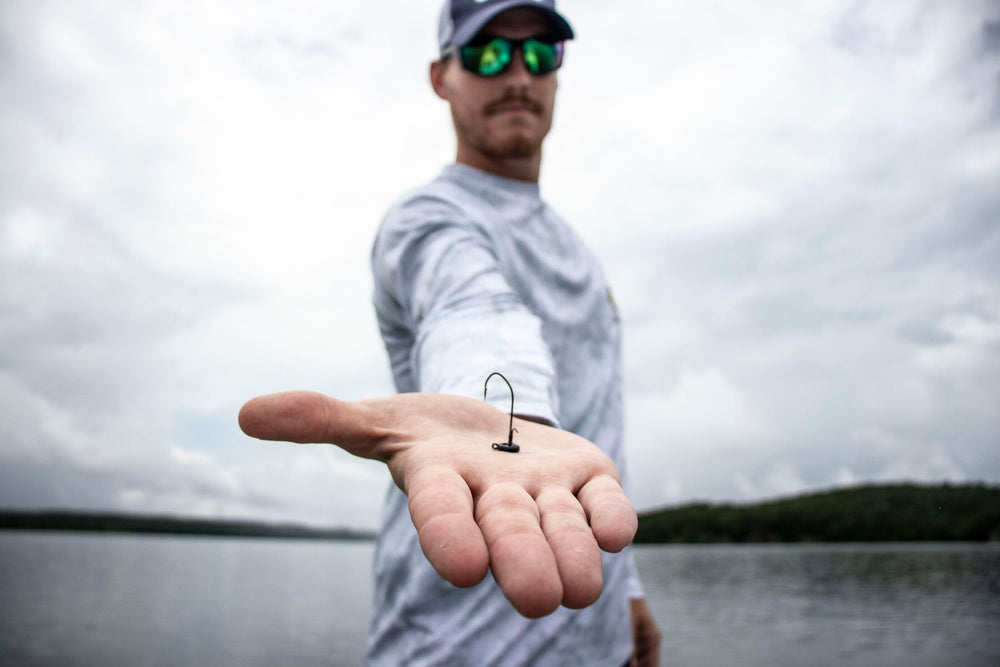Strike King Ned Rig Head features a sickle-style hook and wire keeper for secure hookups.