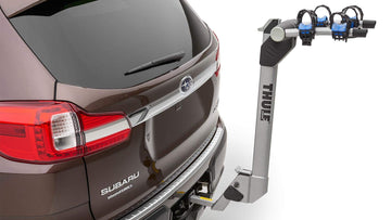 Subaru hitch bike rack on a Forester with anti-sway cages protecting two bikes