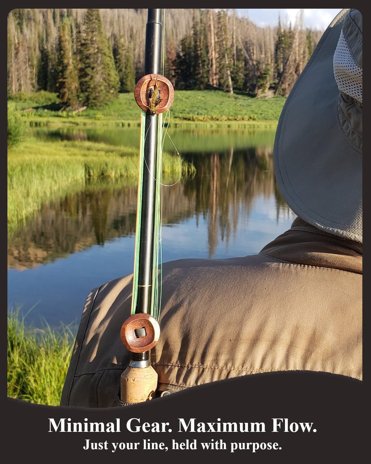 Fly being hooked onto rubber band with line keeper