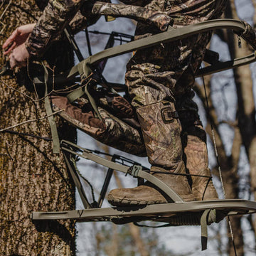 Summit Treestands Viper SD padded armrests reduce fatigue between shots.