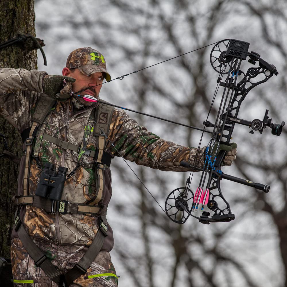 Summit Treestands Pro Safety Harness quick-lock buckles streamline setup.