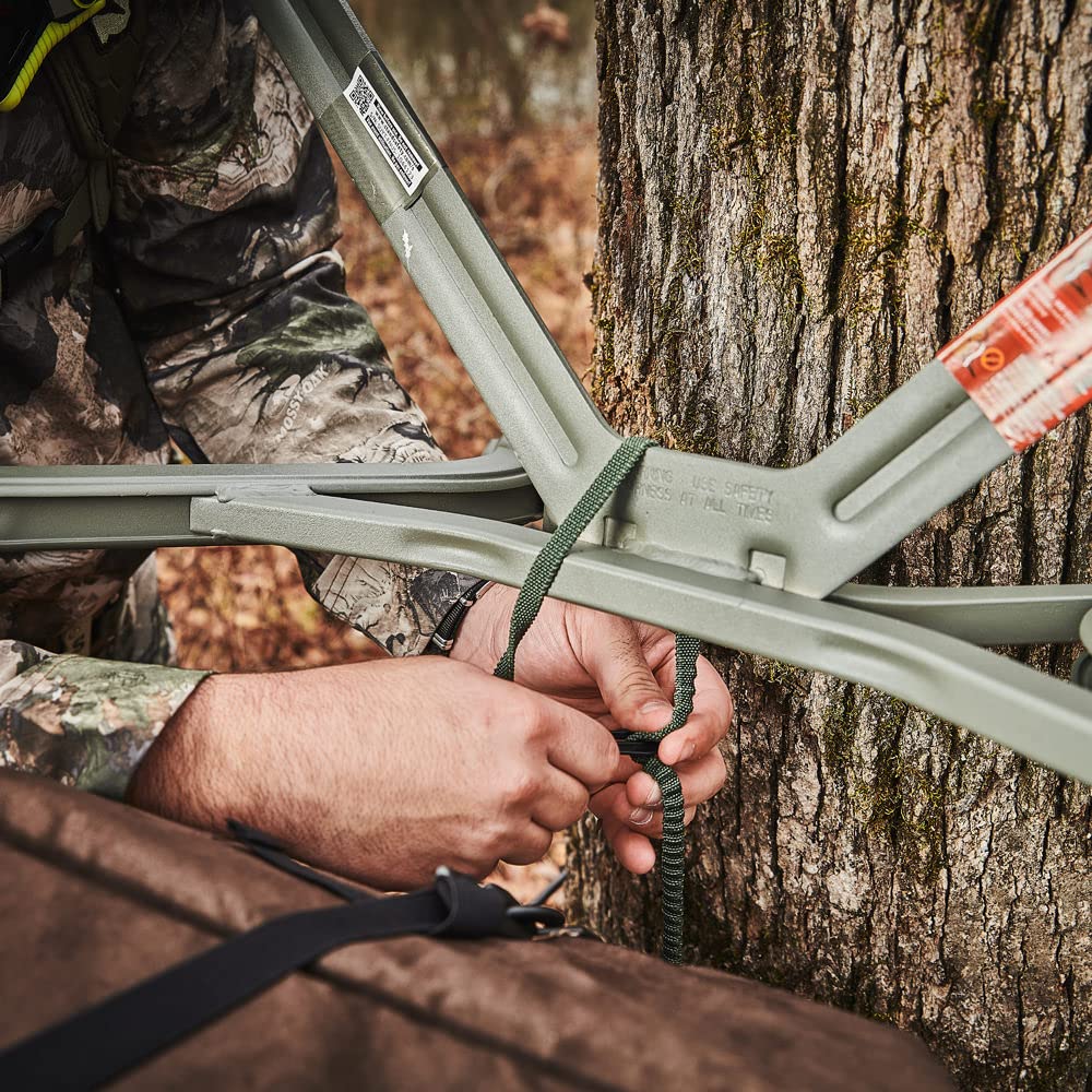 Summit Treestands shoulder straps attached to a tree stand for comfortable climbing.