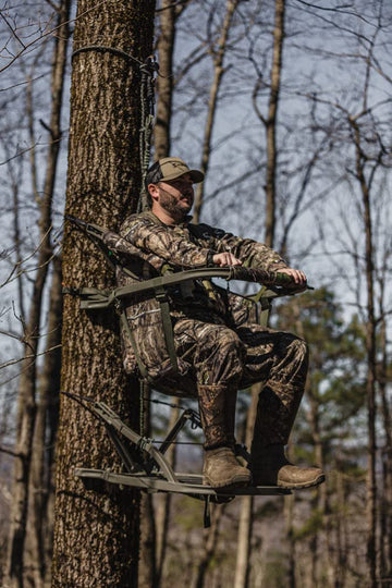Padded sides provide back support while seated in treestand