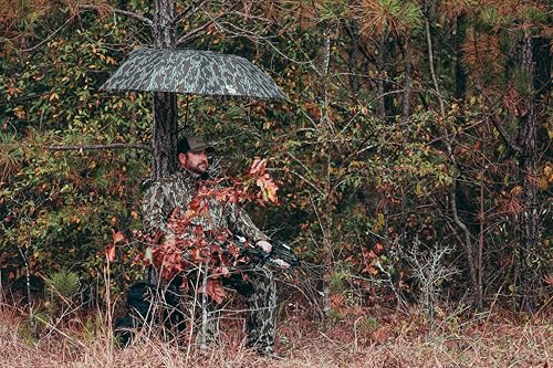 Summit Treestands umbrella in Mossy Oak Original Bottomland camo blends with the woods.